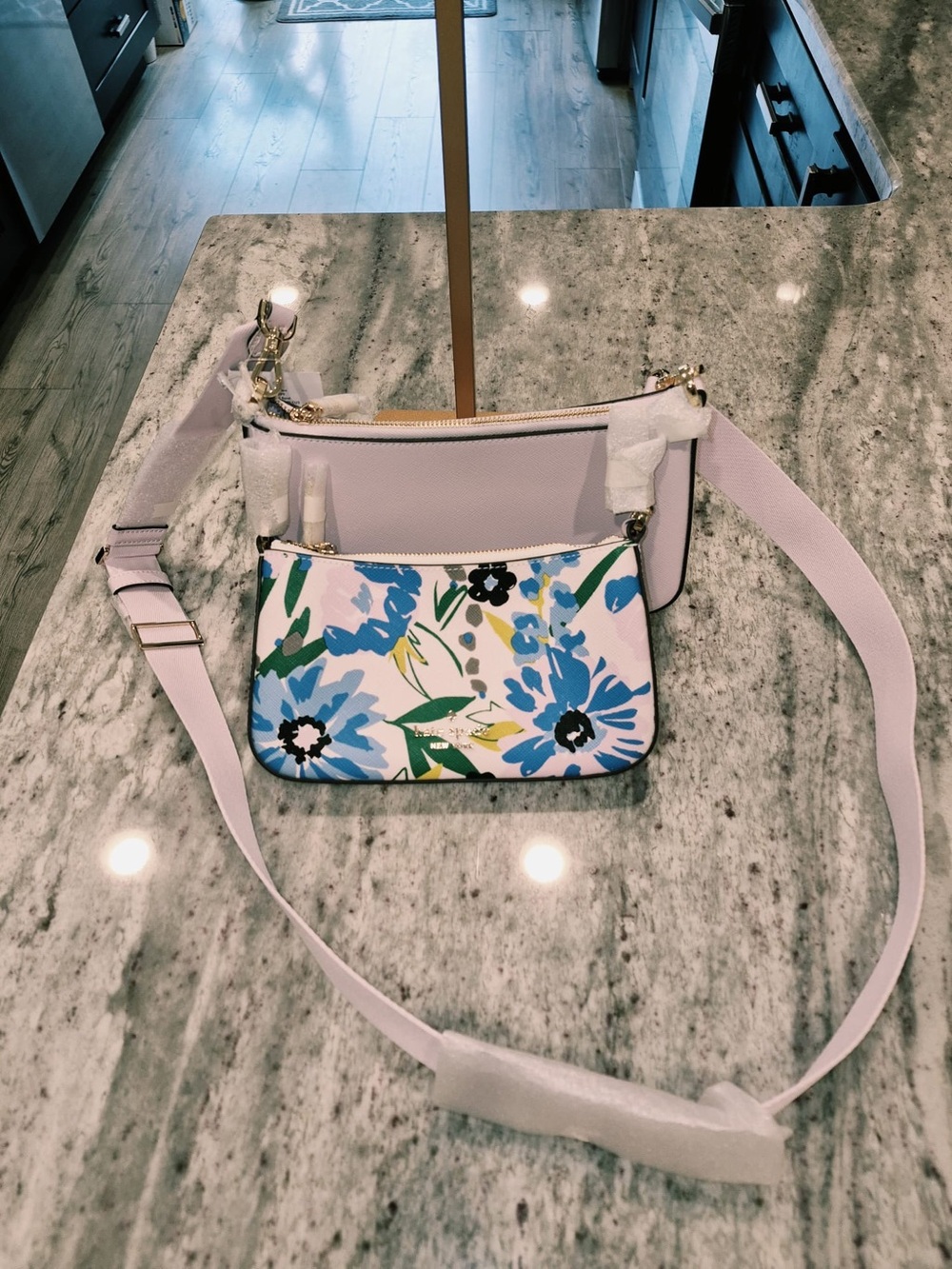 Kate Spade New York Duet Floral Crossbody bag in cream multi with a blue